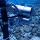 Underwater camera with automatic glass cleaning function